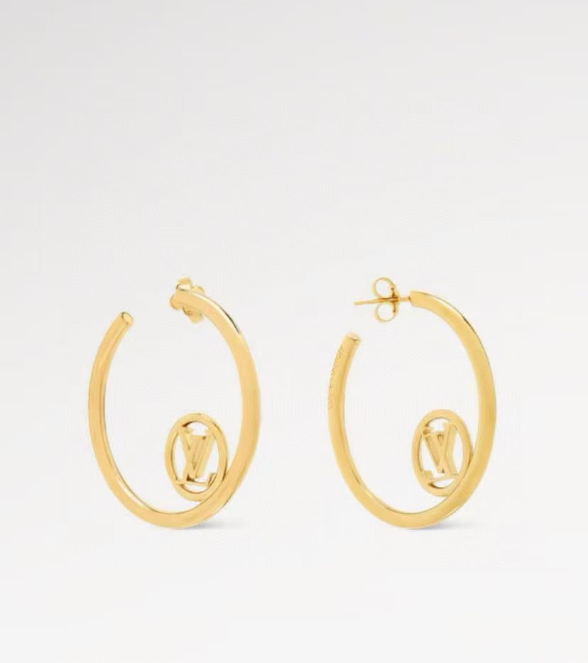 Martin Graham stud earrings in polished metal-tone – side detail