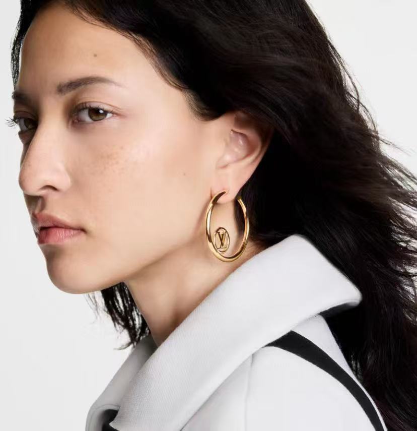 Martin Graham stud earrings in polished metal-tone – front product view