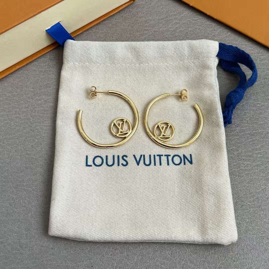 Martin Graham stud earrings in polished metal-tone – styled product view