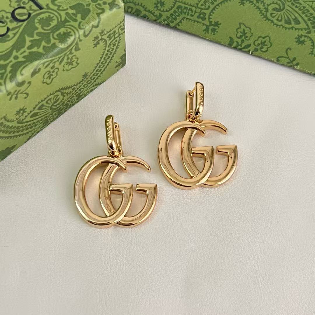 Martin Graham stud earrings in polished metal-tone – main product view