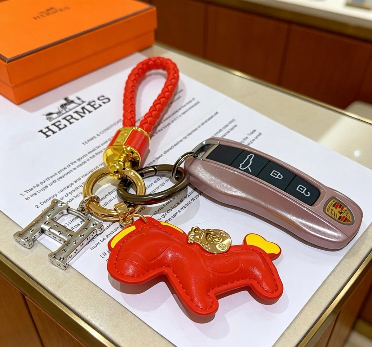 Martin Graham keychain in polished metal-tone – detail view