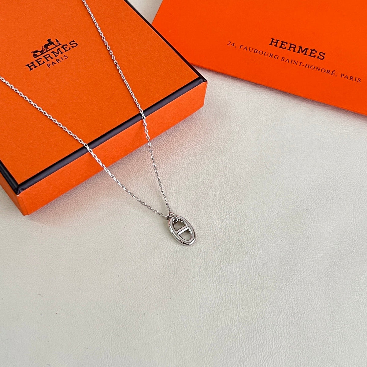 Martin Graham pendant necklace in polished metal-tone – detail view