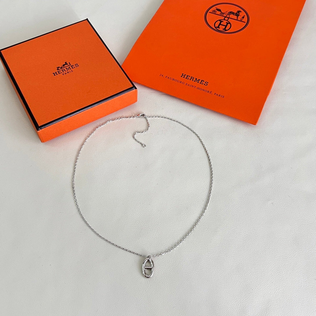 Martin Graham pendant necklace in polished metal-tone – front product view