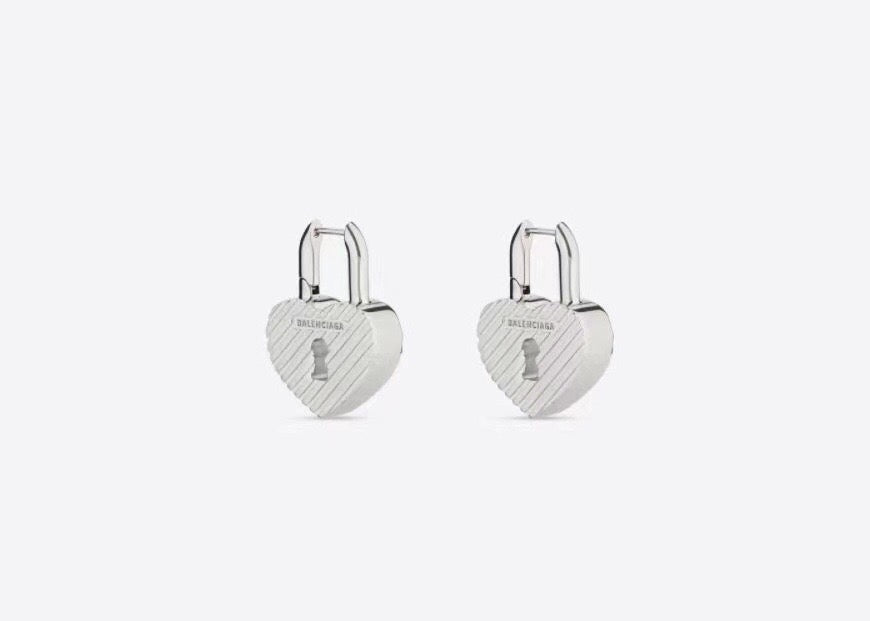 Martin Graham earrings in polished metal-tone – front product view