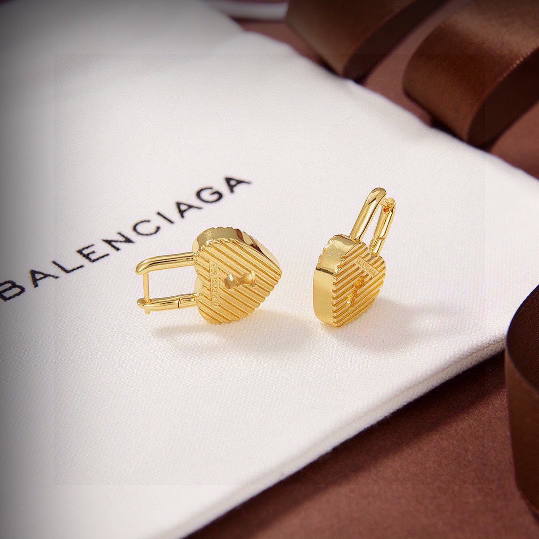 Martin Graham earrings in polished metal-tone – styled product view