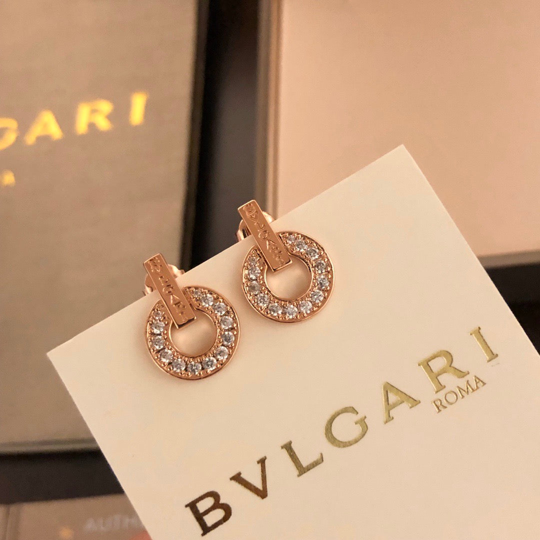 Martin Graham stud earrings in polished metal-tone – main product view
