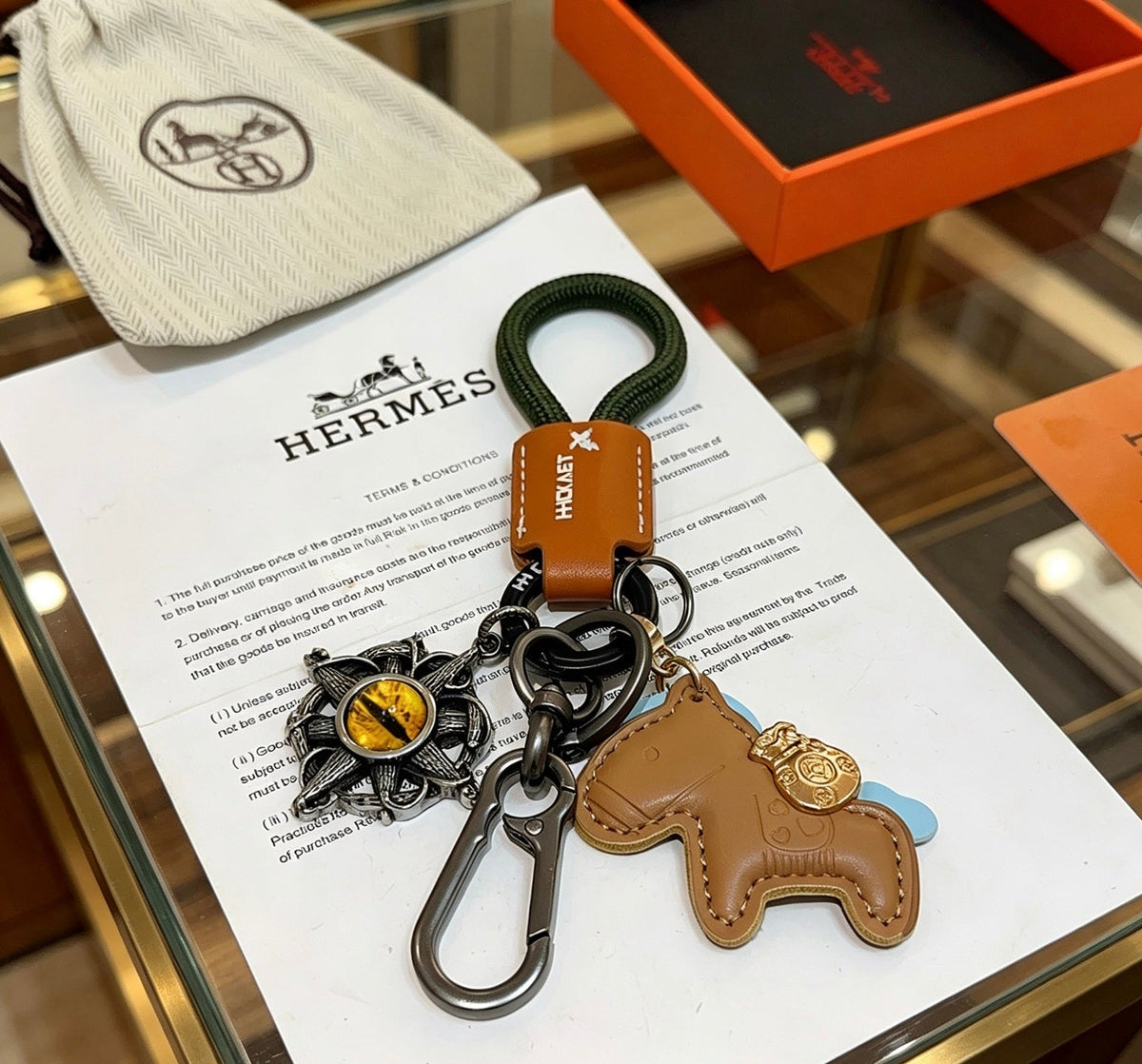 Martin Graham keychain in polished metal-tone – detail view