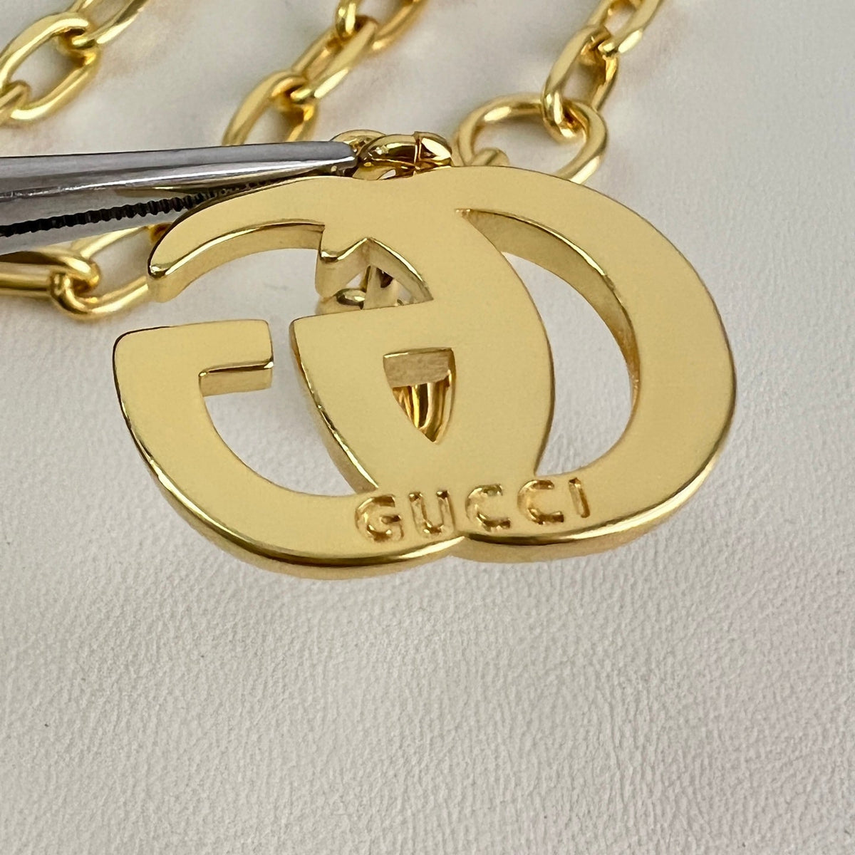 Martin Graham pendant necklace in polished metal-tone – styled product view