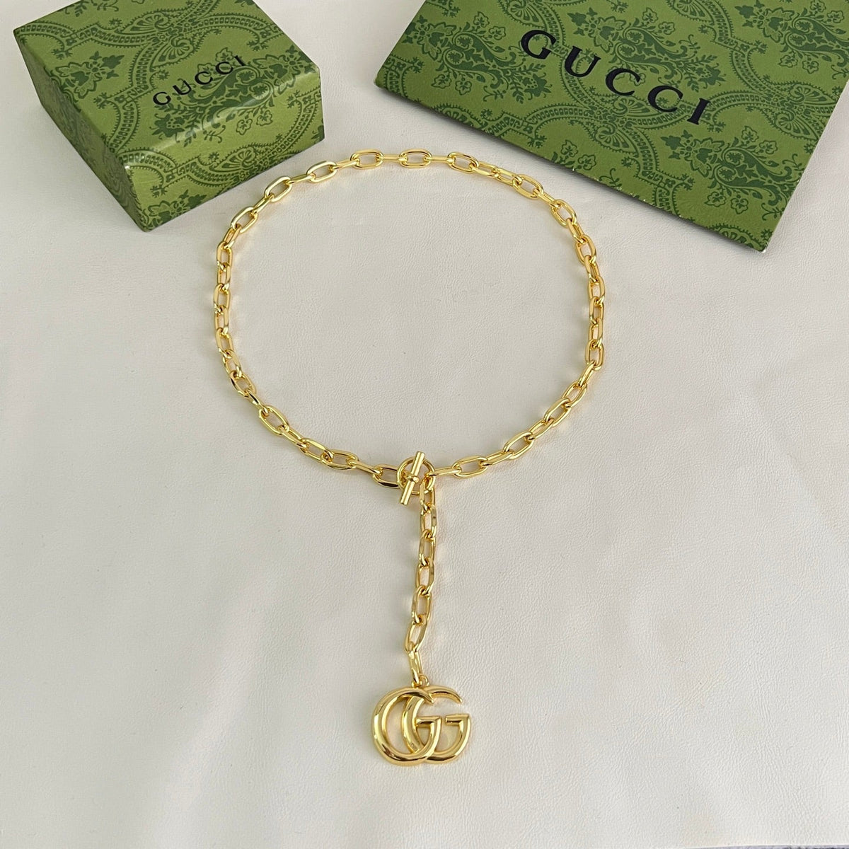 Martin Graham pendant necklace in polished metal-tone – front product view