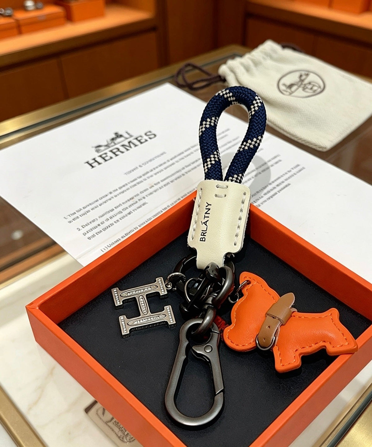 Martin Graham keychain in polished metal-tone – detail view