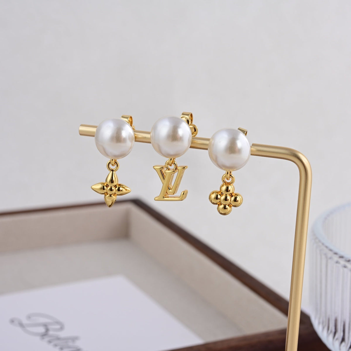 Martin Graham stud earrings in polished metal-tone – main product view