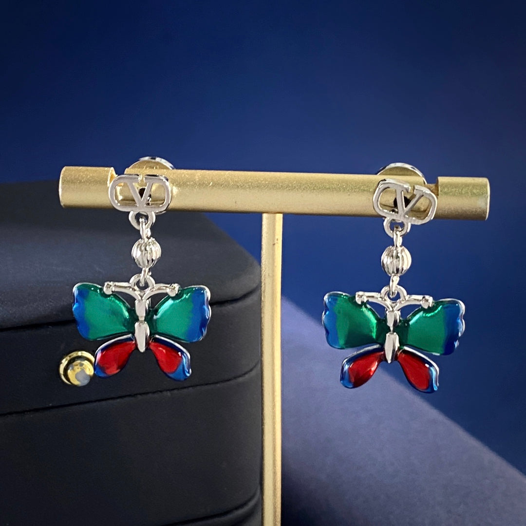 Martin Graham stud earrings in polished metal-tone