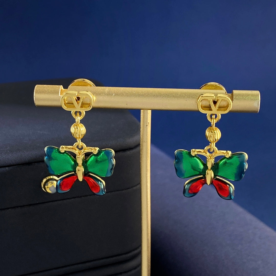 Martin Graham stud earrings in polished metal-tone