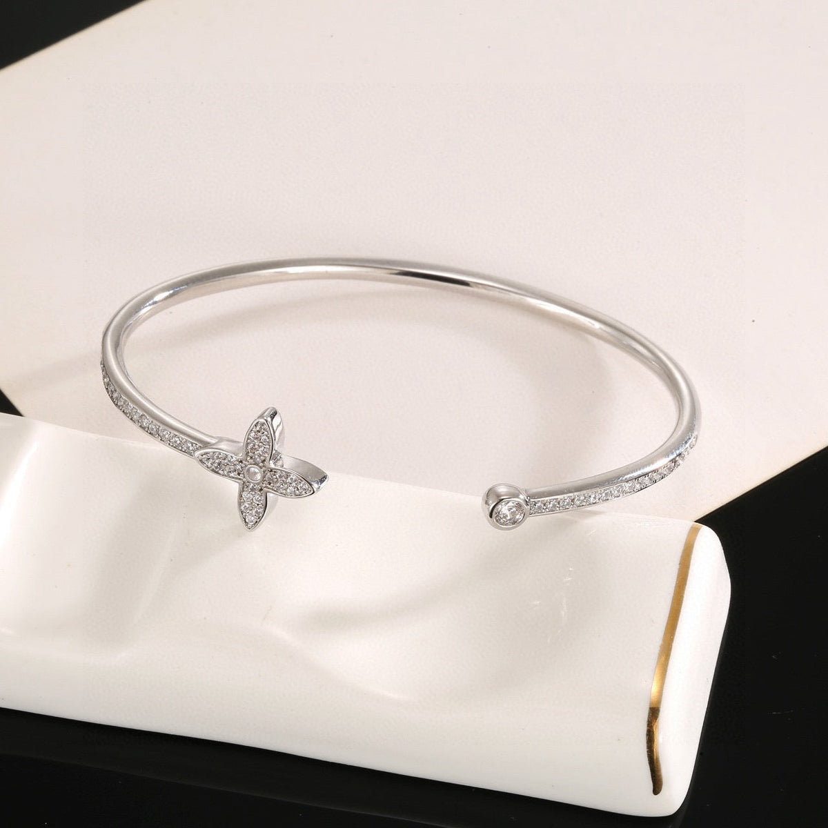 Martin Graham bangle in polished metal-tone – styled product view