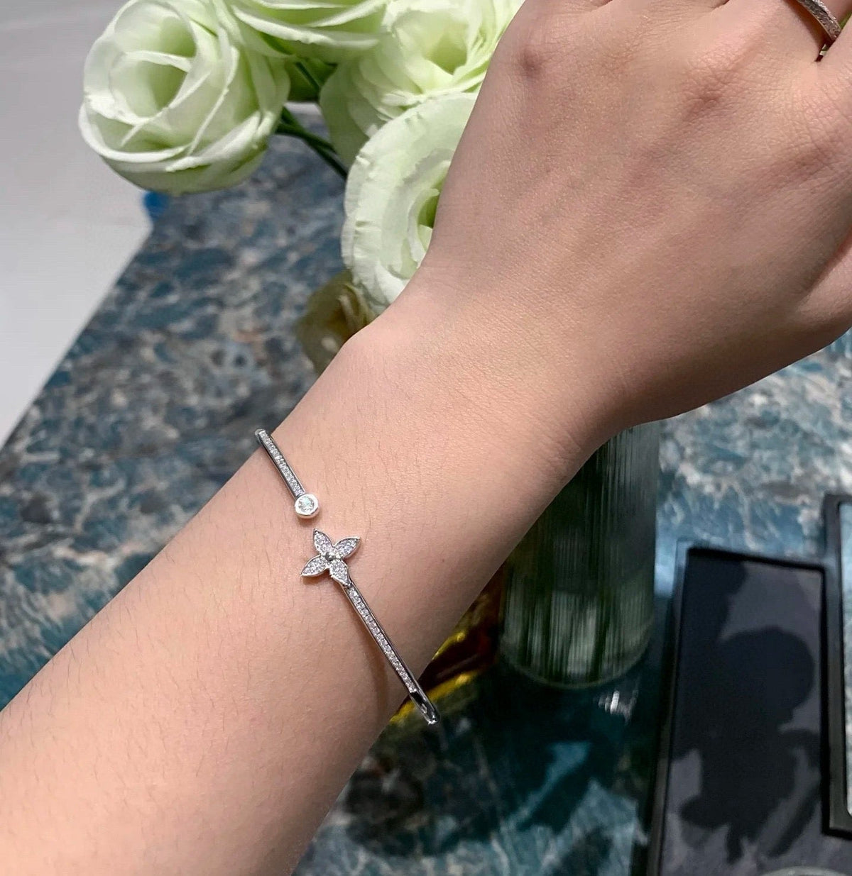Martin Graham bangle in polished metal-tone – close-up detail