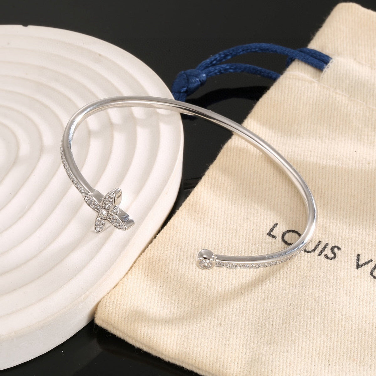 Martin Graham bangle in polished metal-tone – front product view