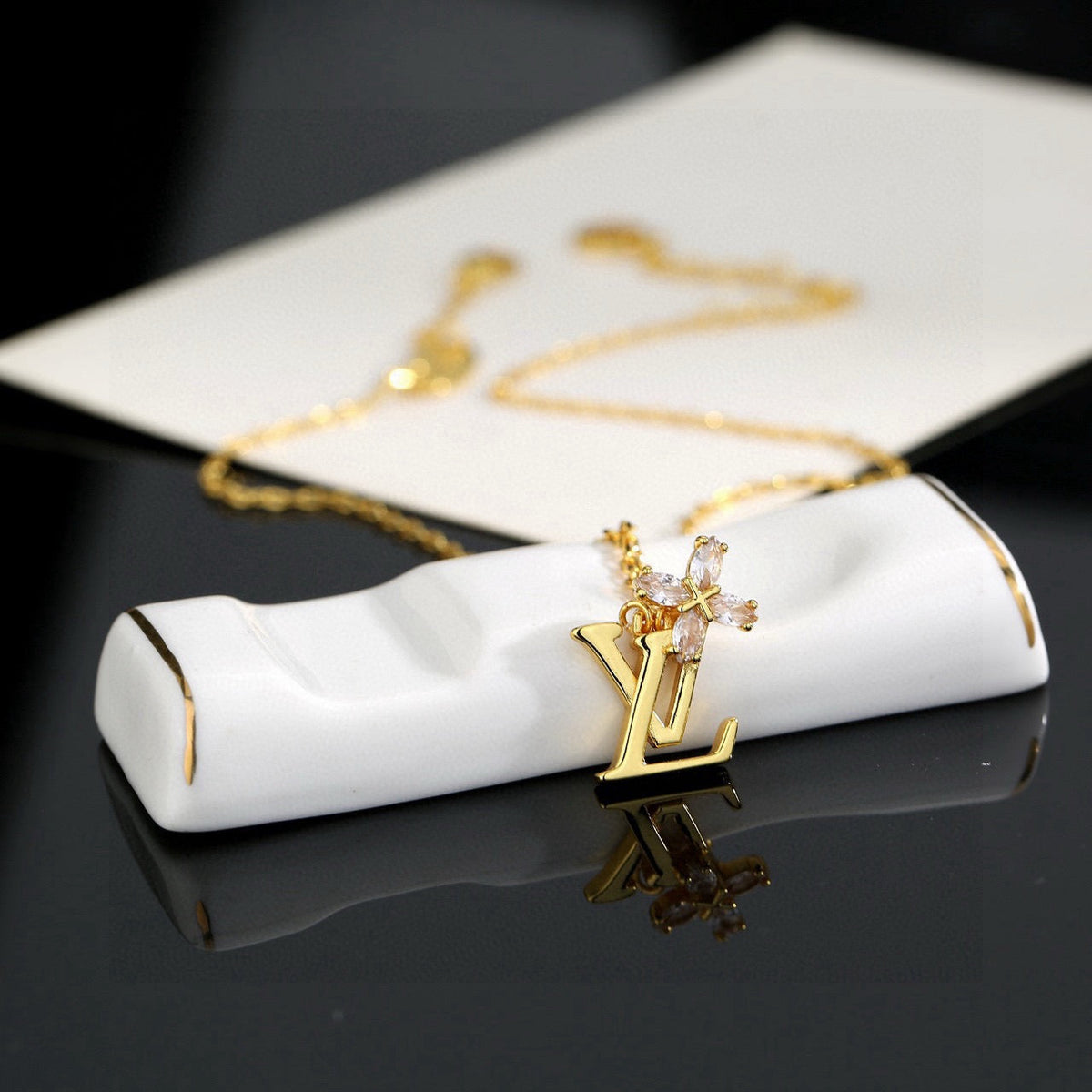 Martin Graham pendant necklace in polished metal-tone – styled product view