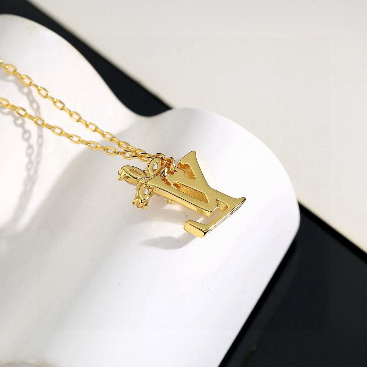 Martin Graham pendant necklace in polished metal-tone – front product view