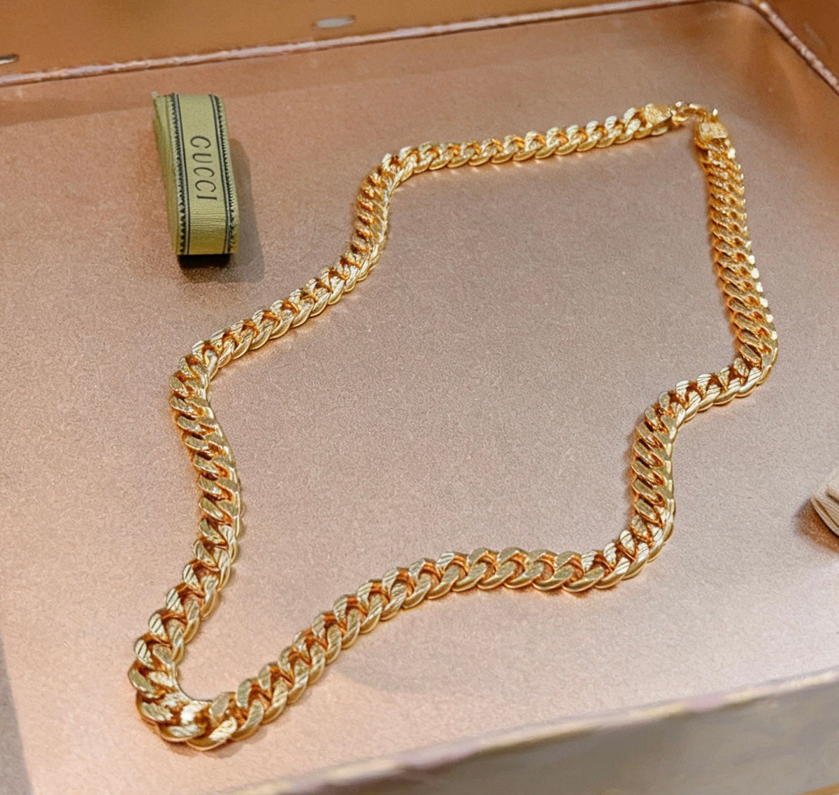 Martin Graham pendant necklace in polished metal-tone – close-up detail