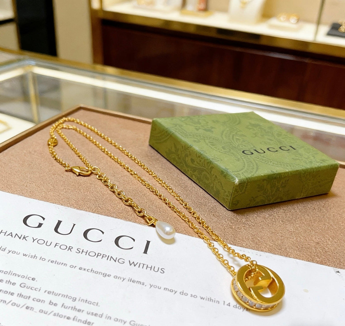 Martin Graham pendant necklace in polished metal-tone – front product view