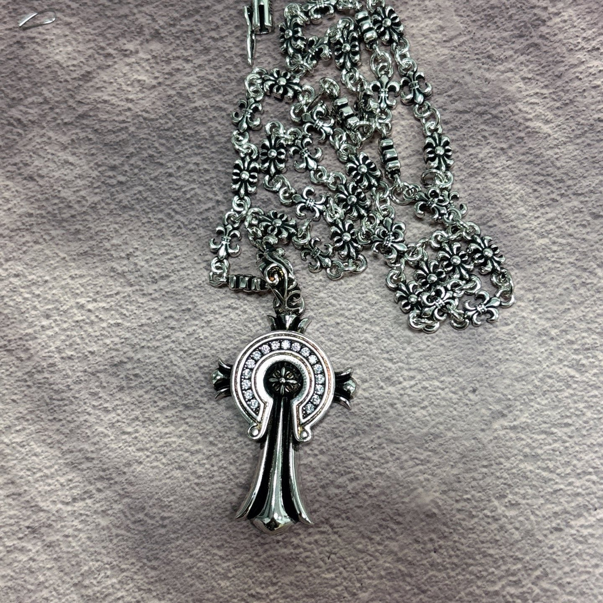 Martin Graham jewelry accessory in polished metal-tone – detail view