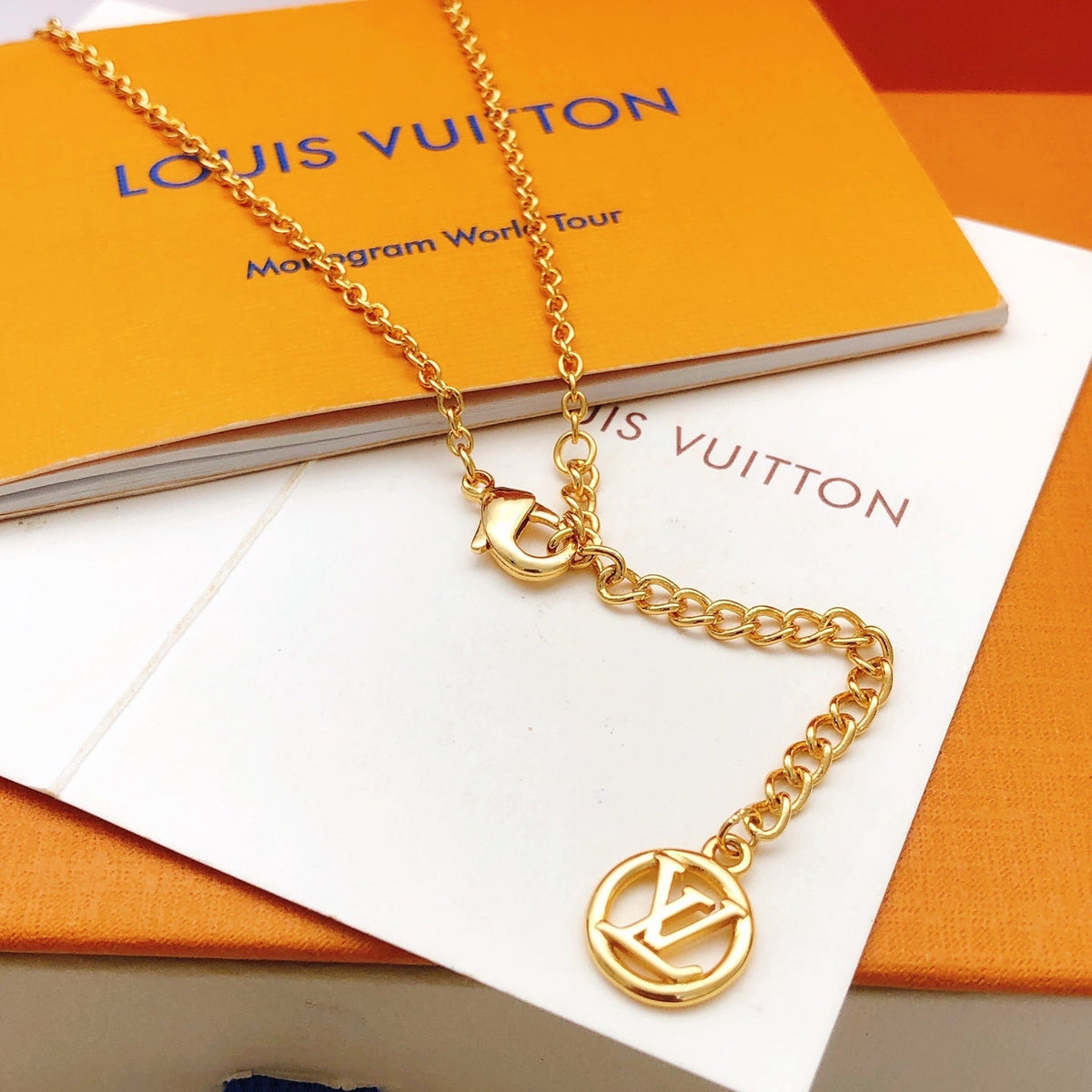 Martin Graham pendant necklace in polished metal-tone – detail view