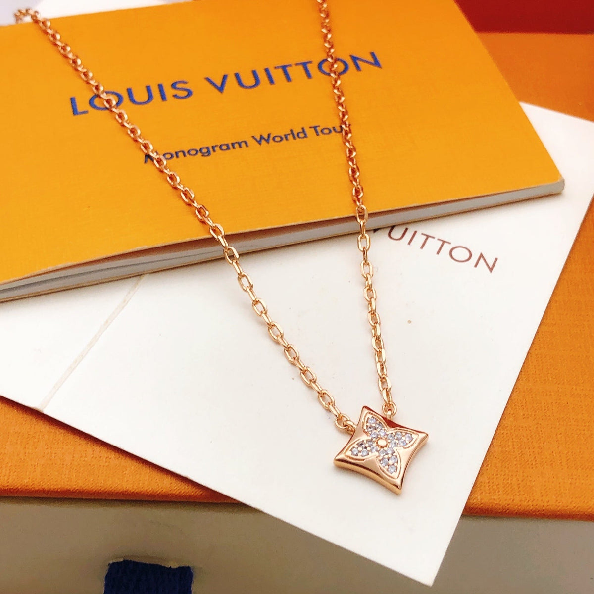 Martin Graham pendant necklace in polished metal-tone – side detail
