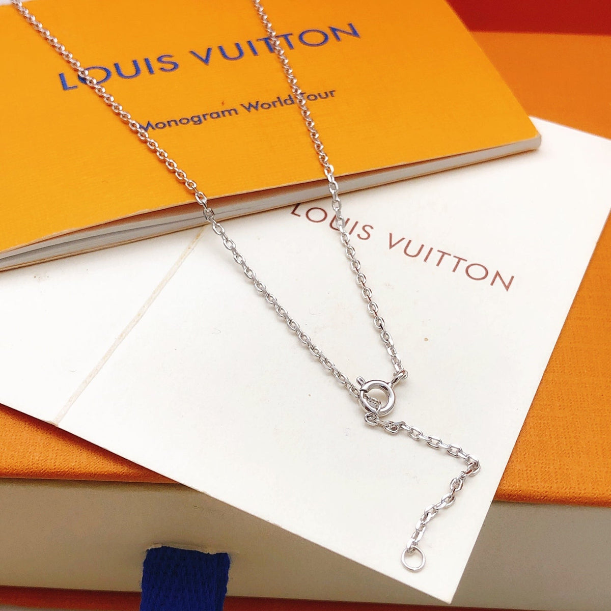 Martin Graham pendant necklace in polished metal-tone – side detail