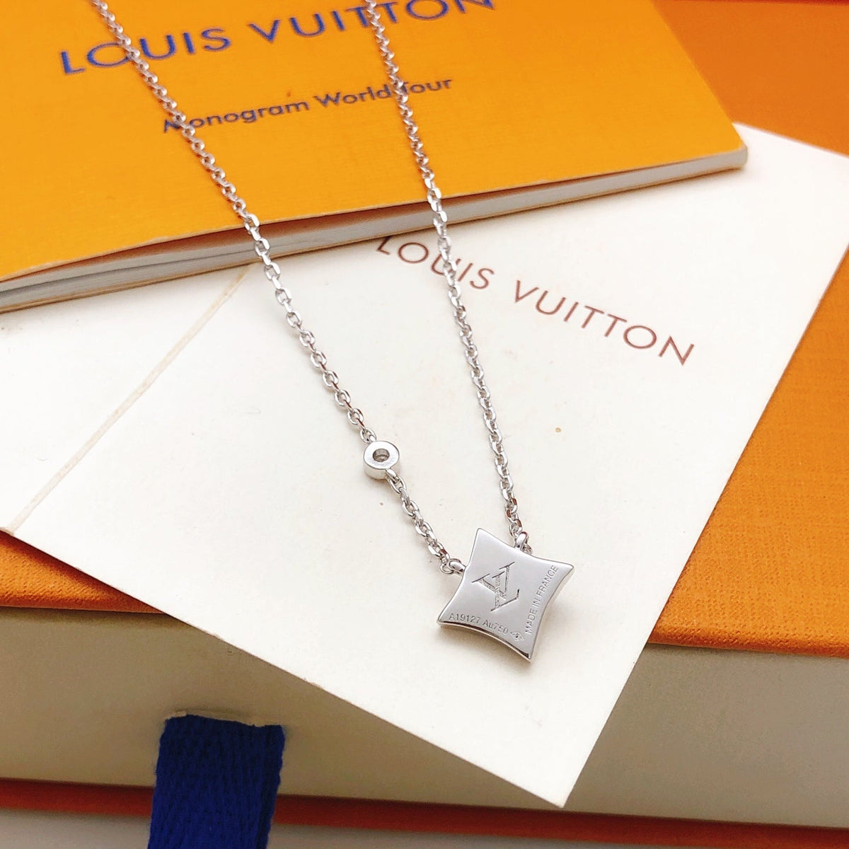 Martin Graham pendant necklace in polished metal-tone – detail view