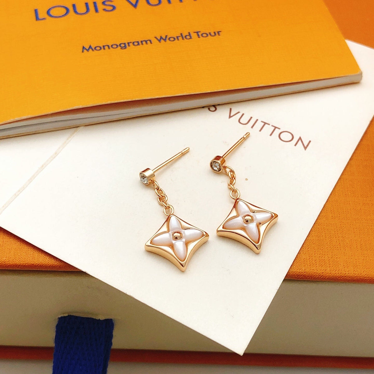Martin Graham stud earrings in polished metal-tone – front product view
