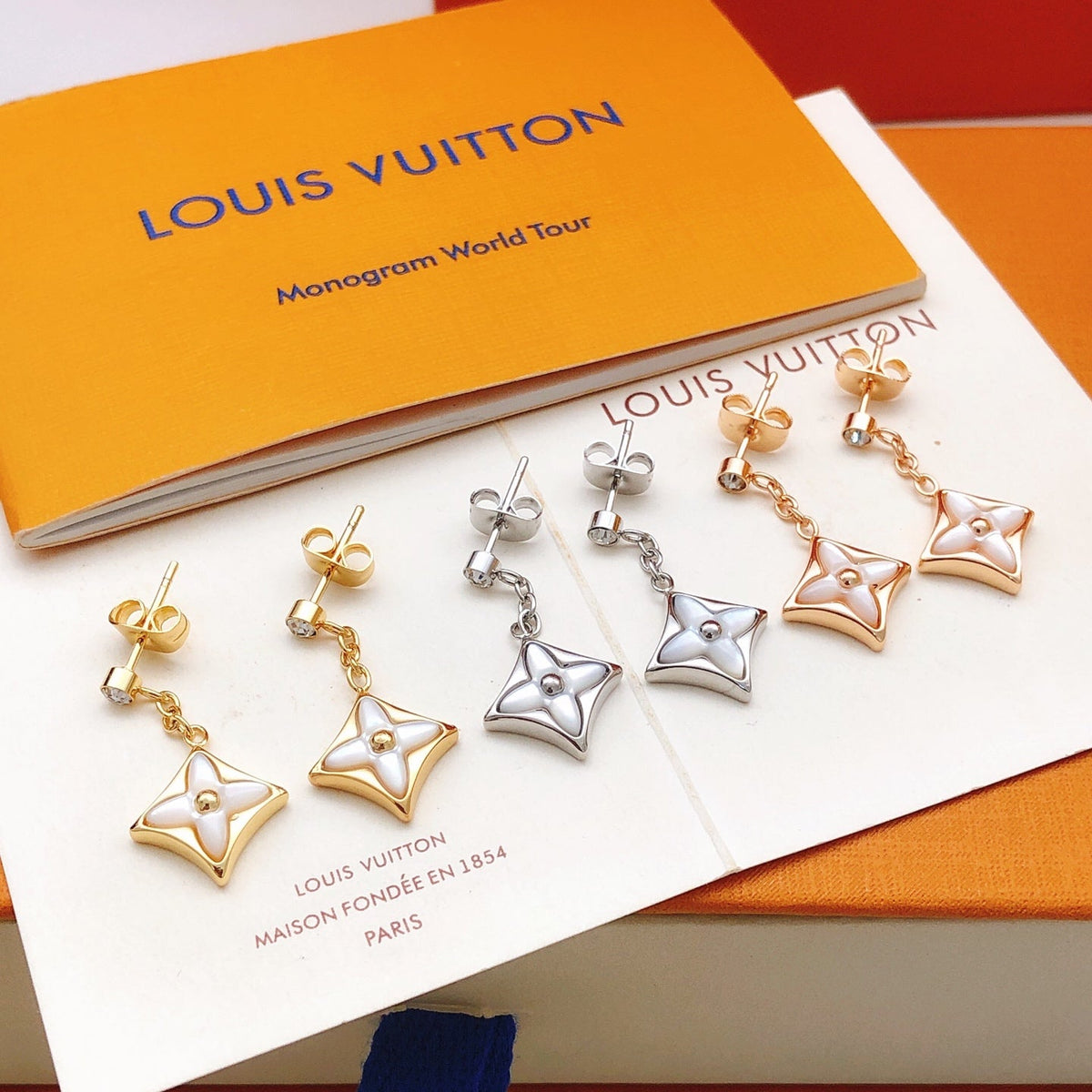 Martin Graham stud earrings in polished metal-tone – styled product view