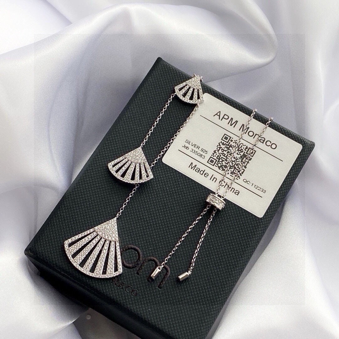 Martin Graham pendant necklace in polished metal-tone – side detail