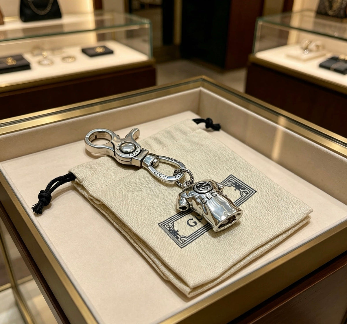 Martin Graham keychain in polished metal-tone – detail view