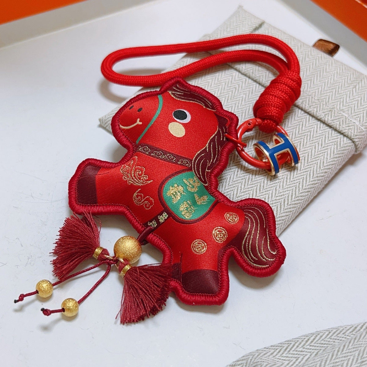 Martin Graham keychain in polished metal-tone – front product view
