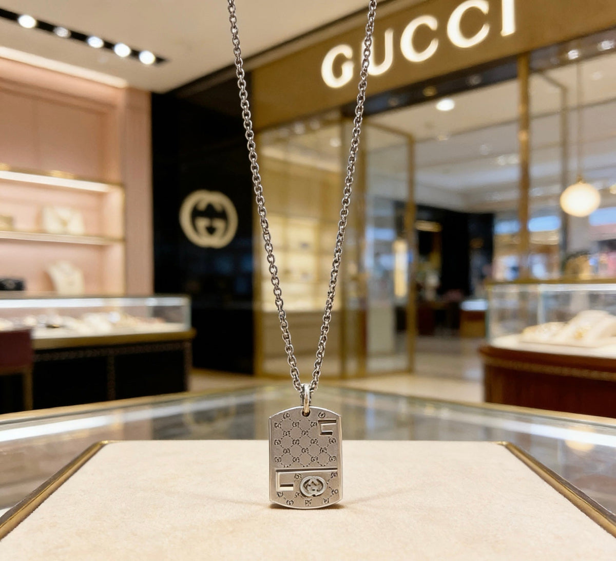 Martin Graham pendant necklace in polished metal-tone – detail view