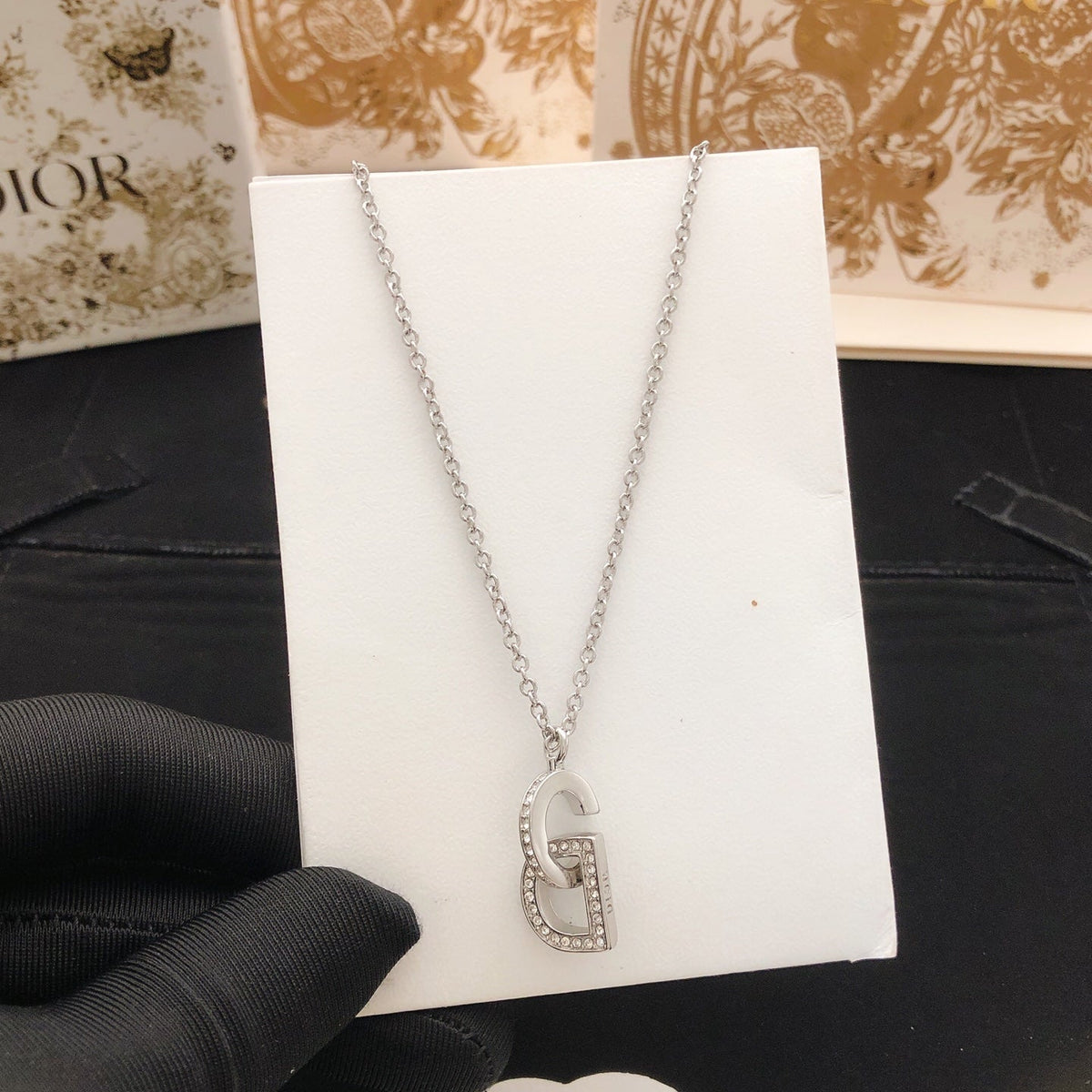 Martin Graham pendant necklace in polished metal-tone – detail view