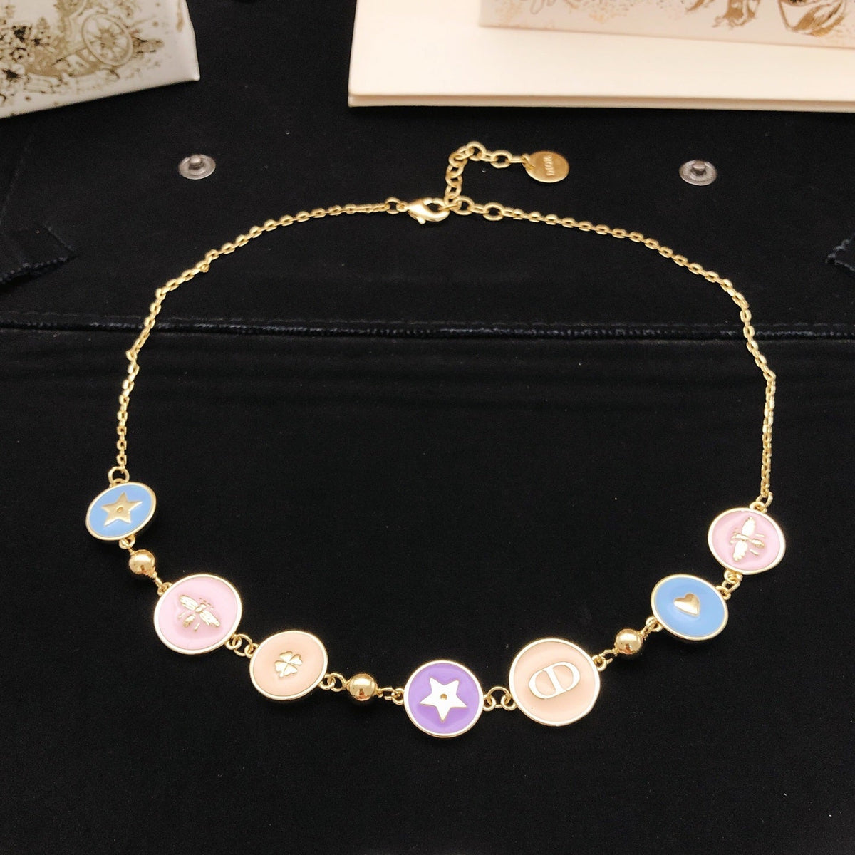 Martin Graham pendant necklace in polished metal-tone – front view
