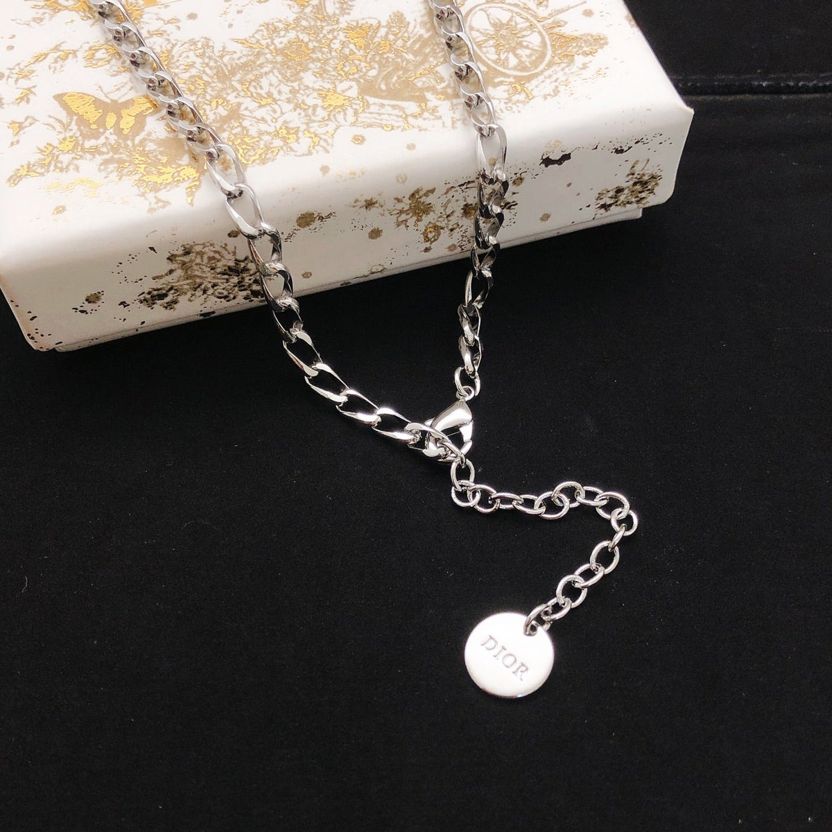 Martin Graham pendant necklace in polished metal-tone – front view