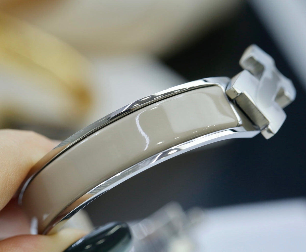 Martin Graham bangle in polished metal-tone – close-up detail