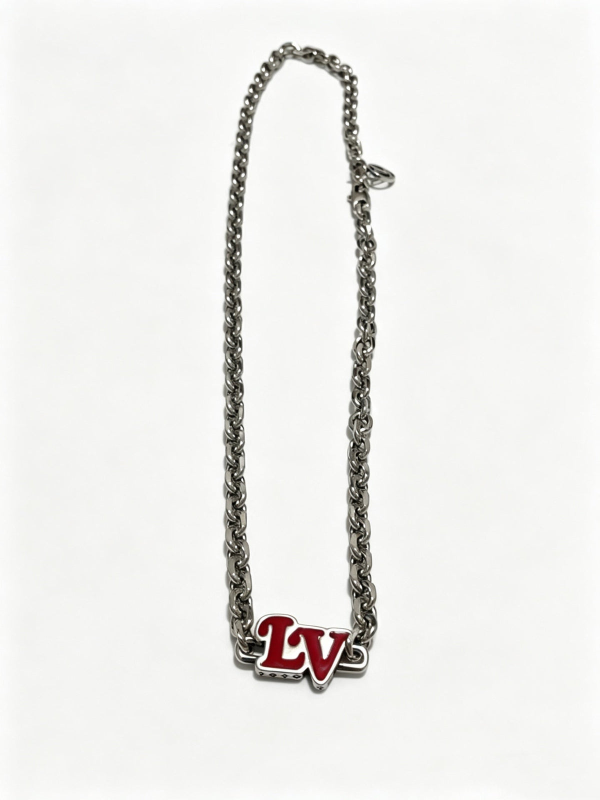 Martin Graham pendant necklace in polished metal-tone – side detail