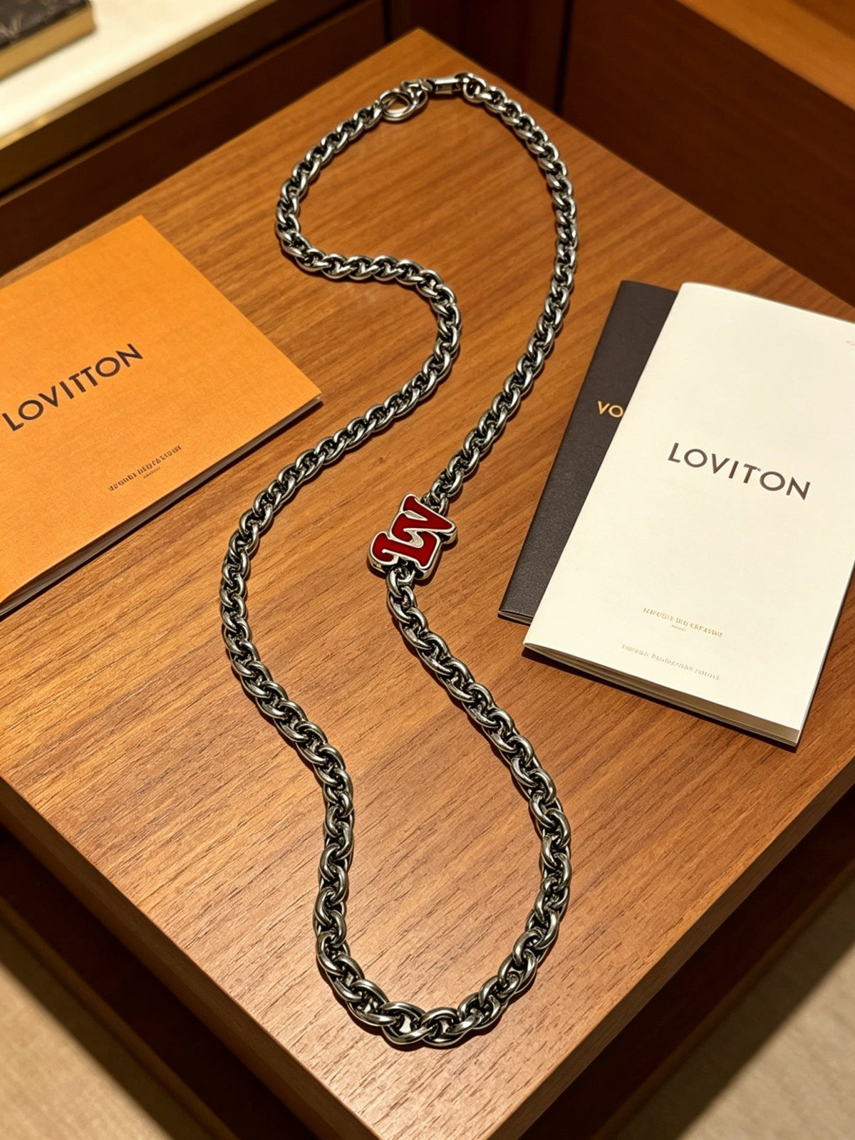 Martin Graham pendant necklace in polished metal-tone – close-up detail