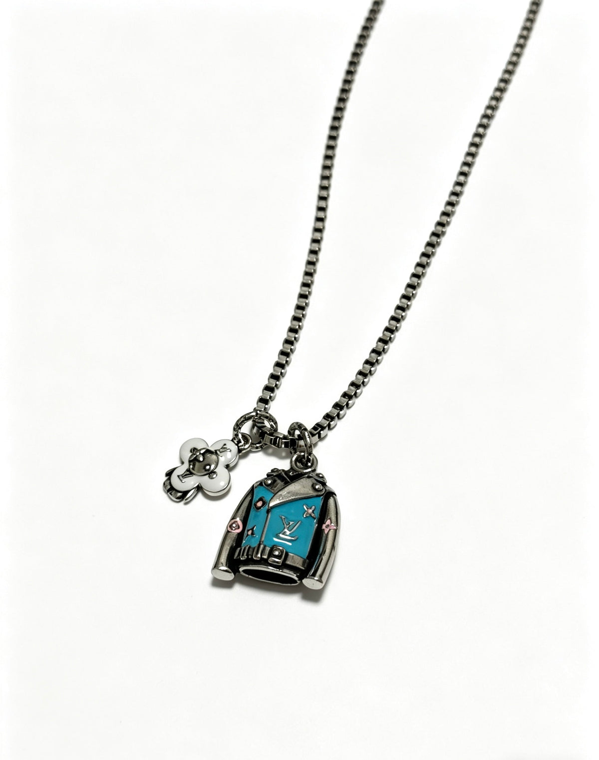Martin Graham pendant necklace in polished metal-tone – side detail