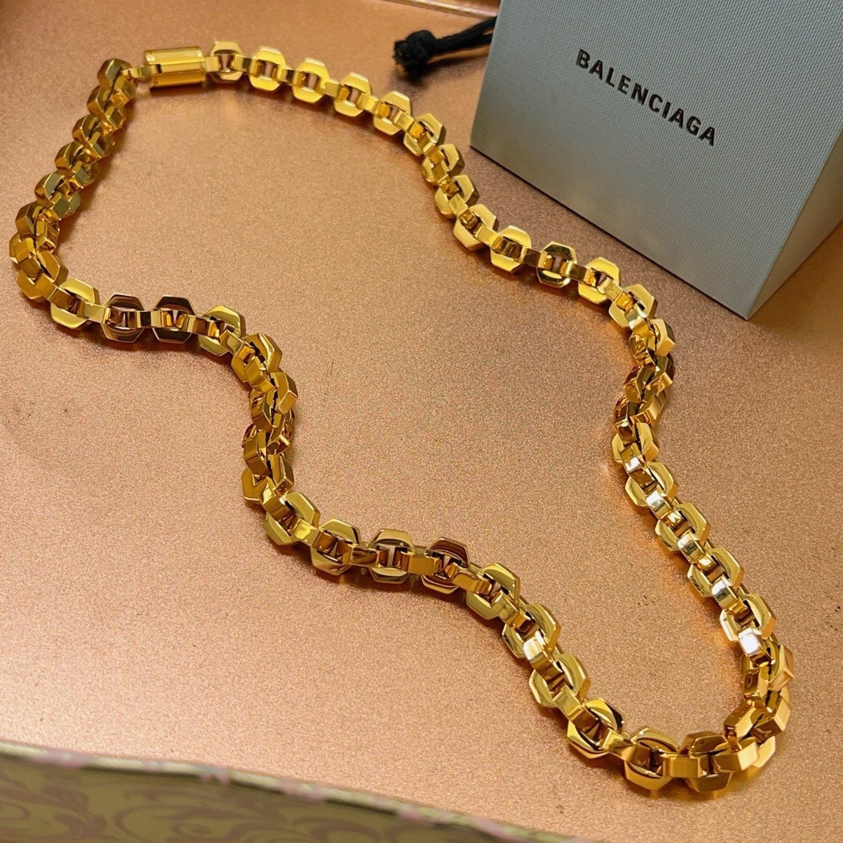 Martin Graham pendant necklace in polished metal-tone – close-up detail