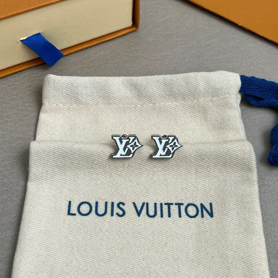 Martin Graham stud earrings in polished metal-tone – detail view