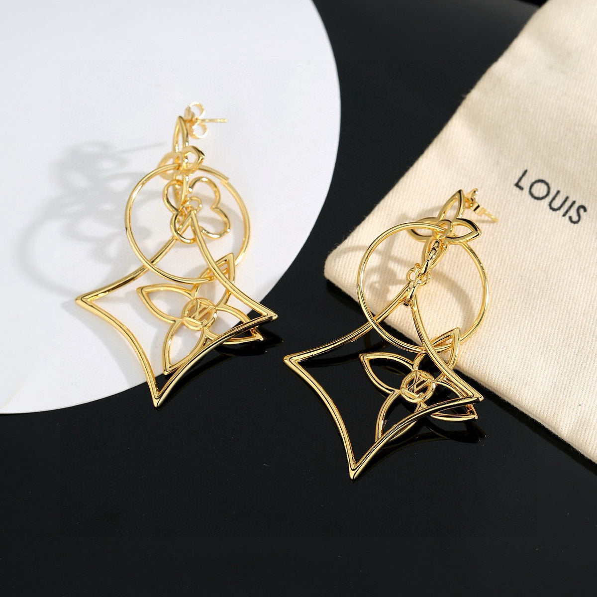 Martin Graham stud earrings in polished metal-tone – side detail