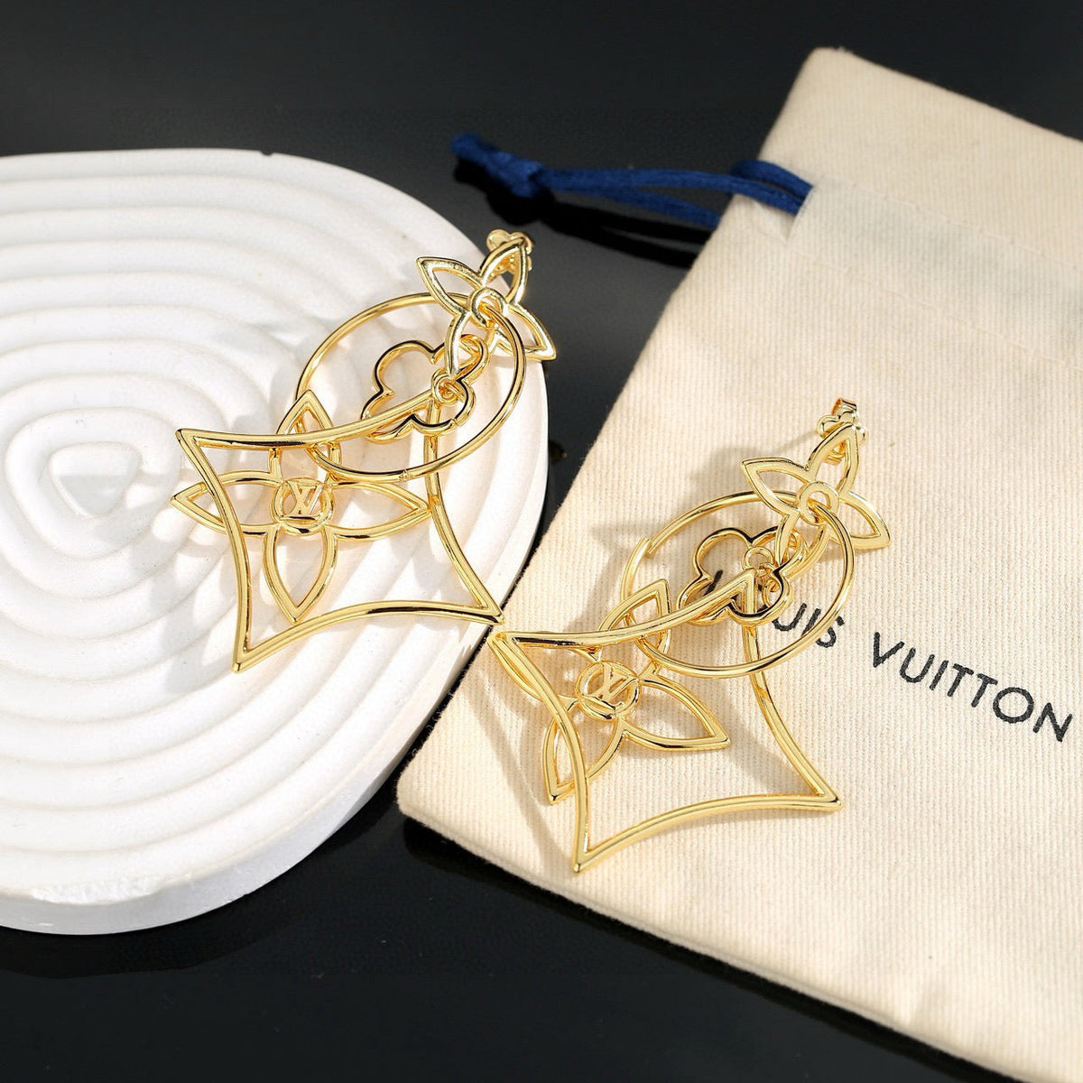 Martin Graham stud earrings in polished metal-tone – main product view