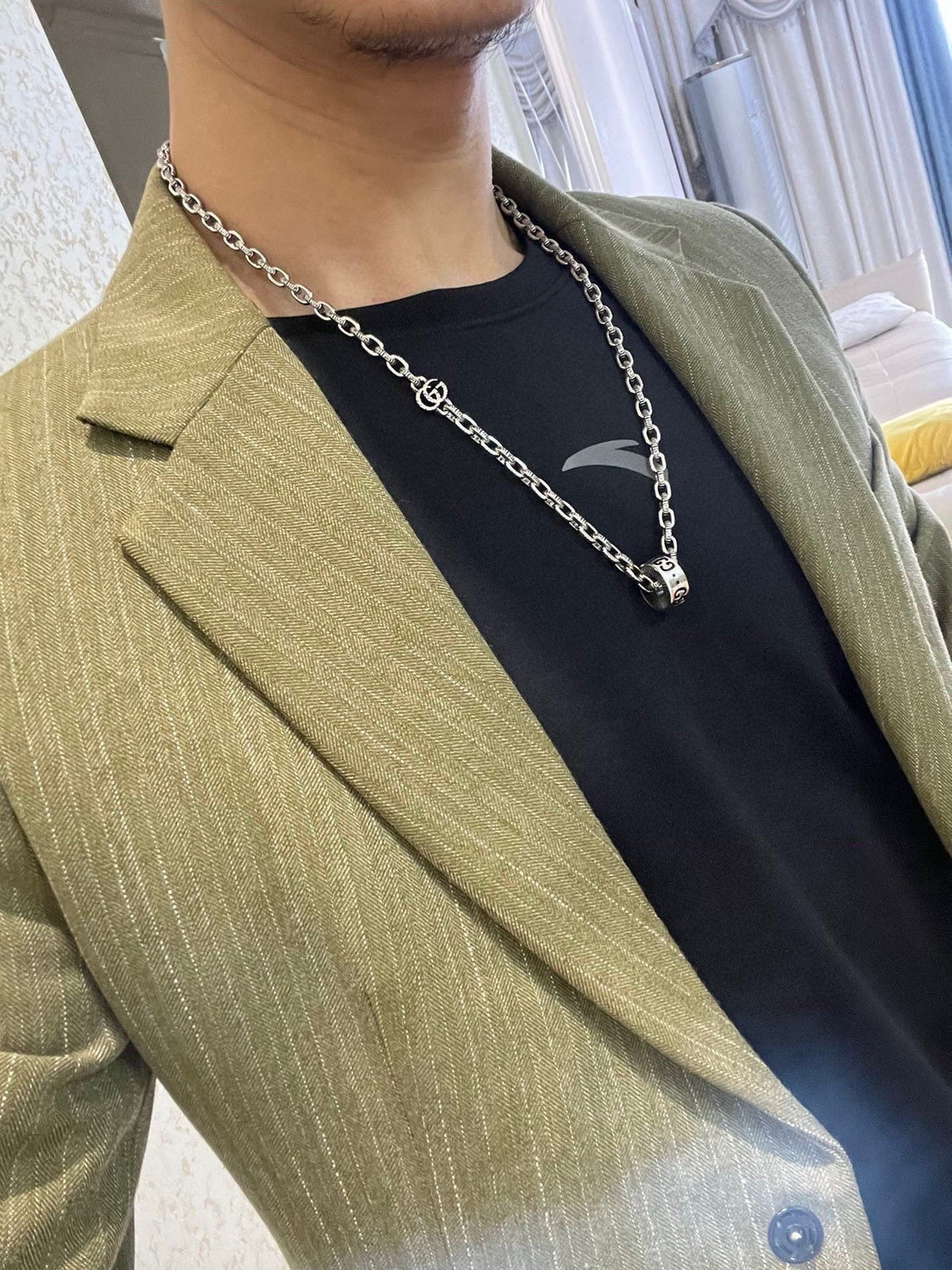 Martin Graham pendant necklace in polished metal-tone – styled product view