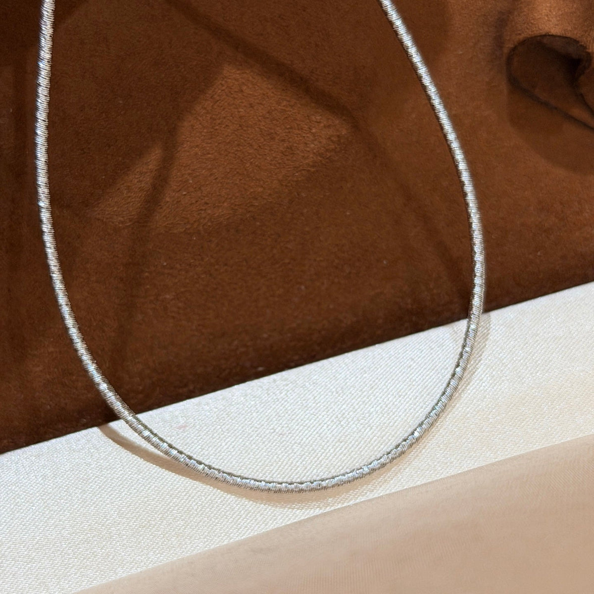 Martin Graham pendant necklace in polished metal-tone – styled product view