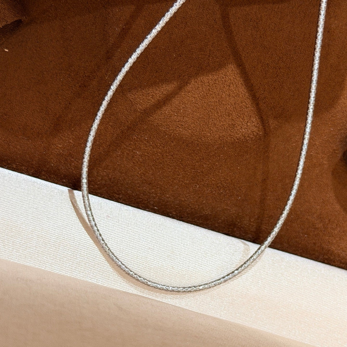Martin Graham pendant necklace in polished metal-tone – front product view