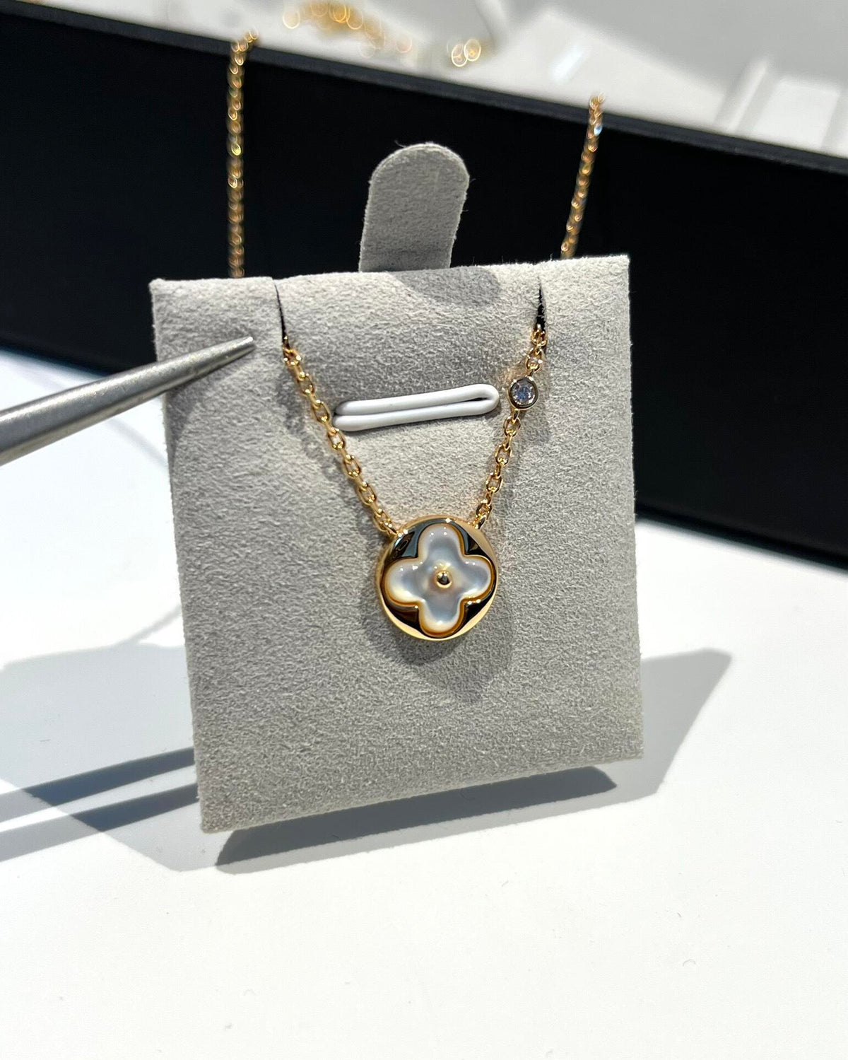 Martin Graham pendant necklace in polished metal-tone – detail view